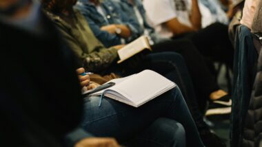 Photo of woman reading book. Credit: Sincerely Media, Unsplash.